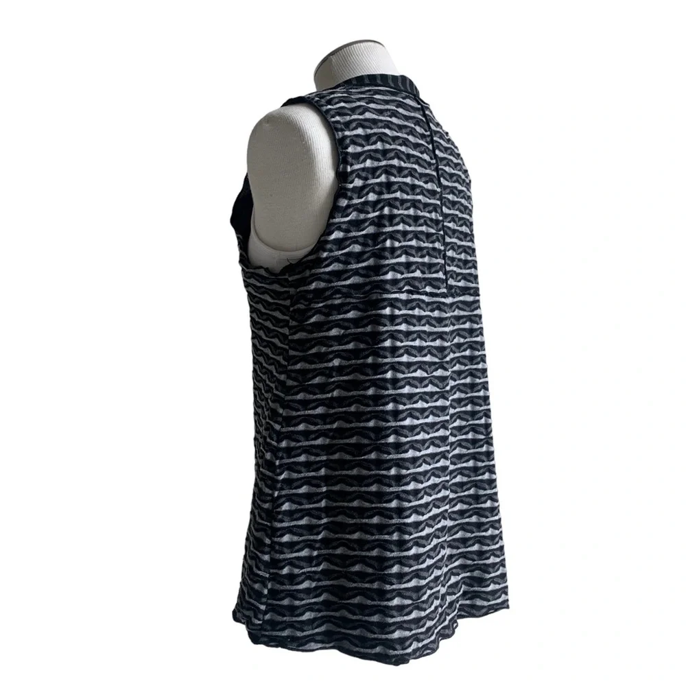 Apropos knit vest, black, gray geometrical jersey print adds warmth and layers M